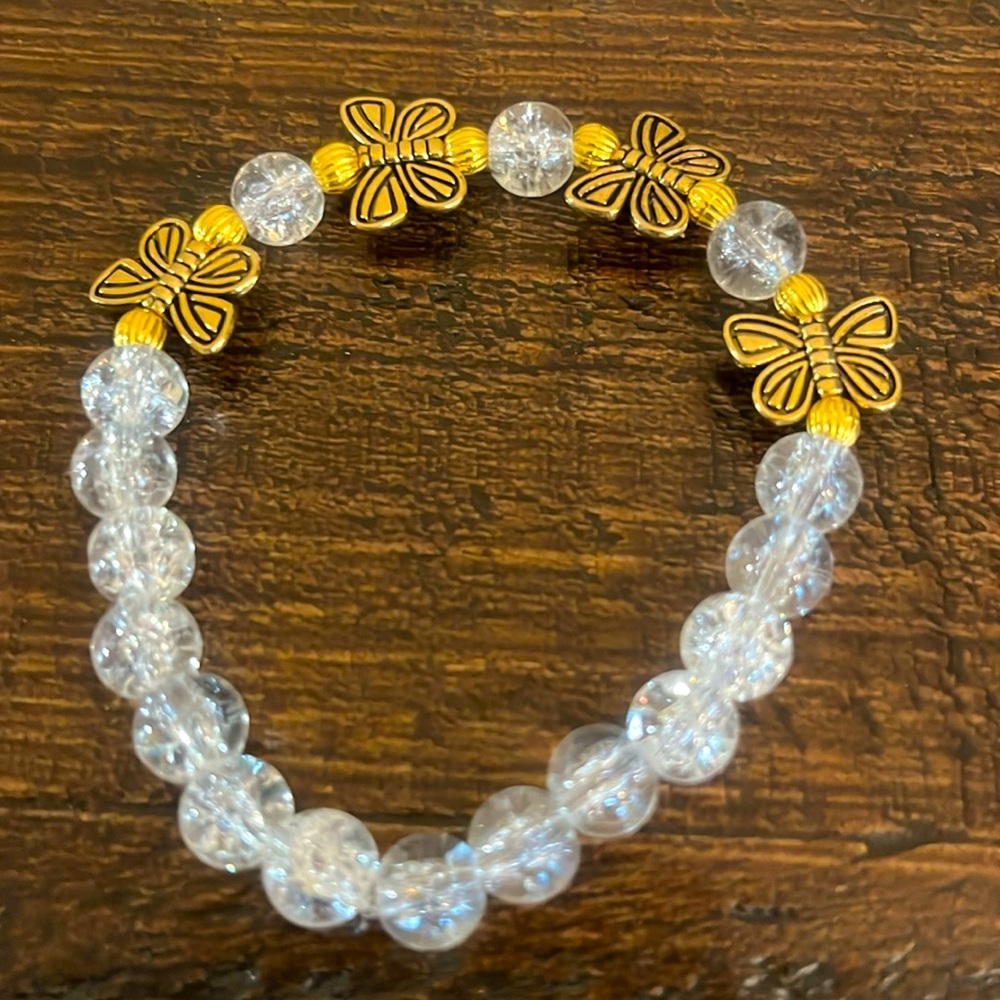 Clear glass bead butterfly collection. we are out or give us a gift.